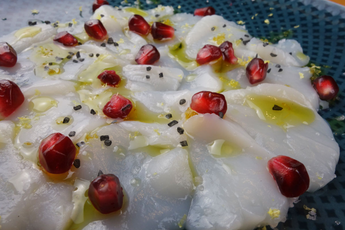 Scallop slices arranged on a plate