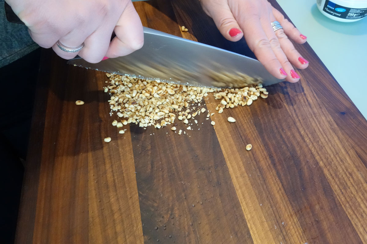 Pine nuts are chopped